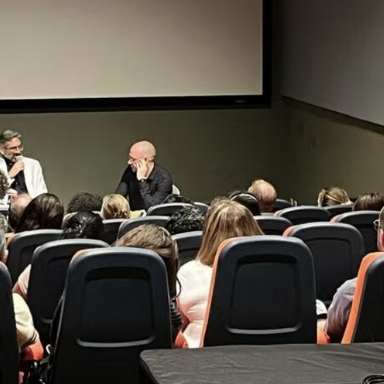 Screening Room full of participants watching a talkback with Christophe Katrib